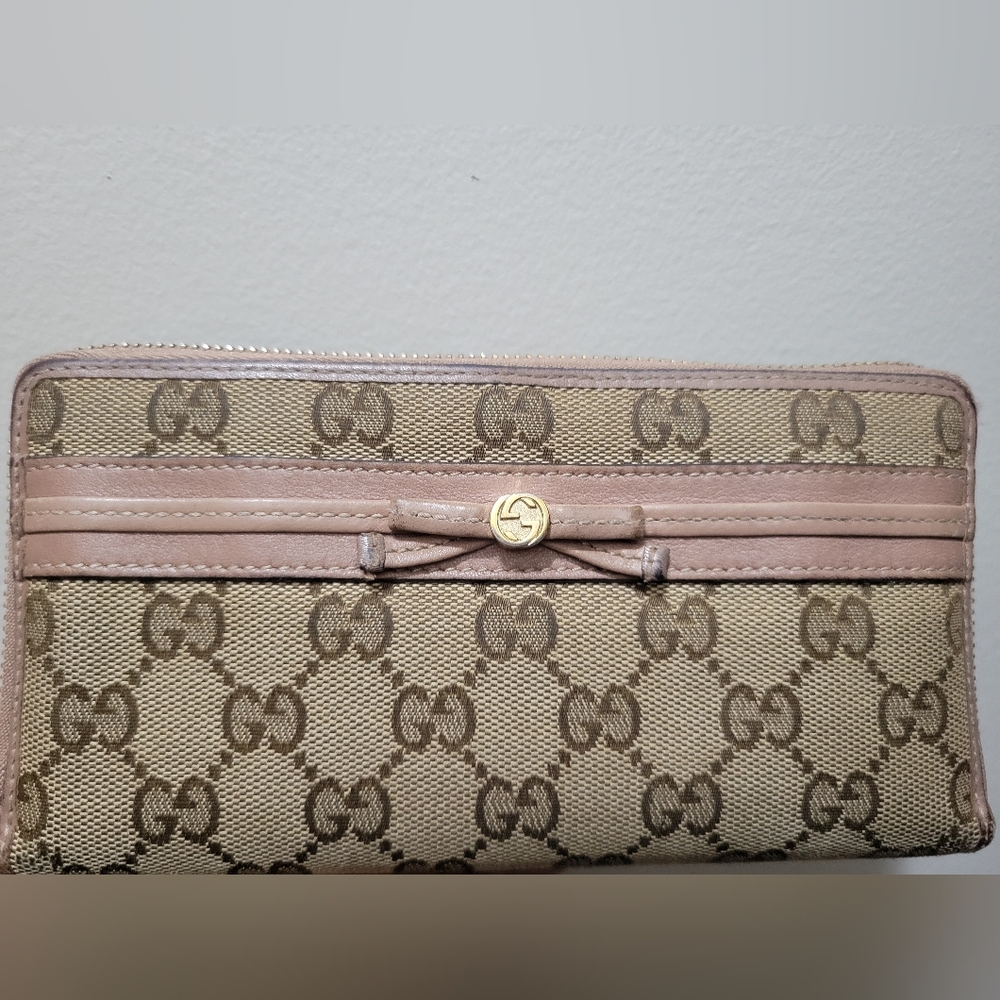 Gucci full zip around brown and pink wallet. GUC